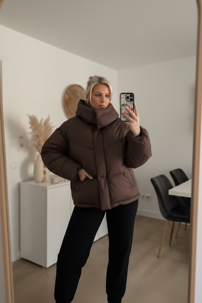 Brown puffer coat mirror selfie 1